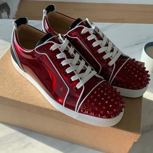 Christian Louboutin psychedelic candy apple red low tops!